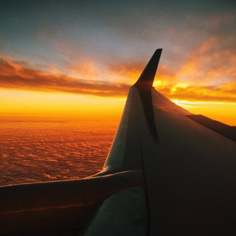 flight-sunset-red-clouds